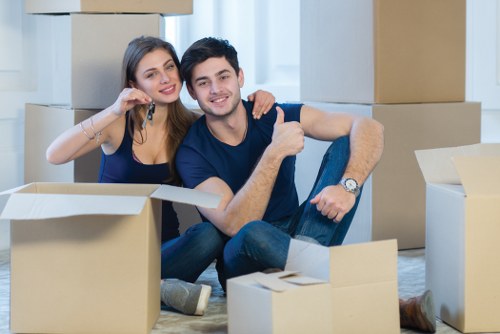 Local moving team handling furniture in a Wandsworth property