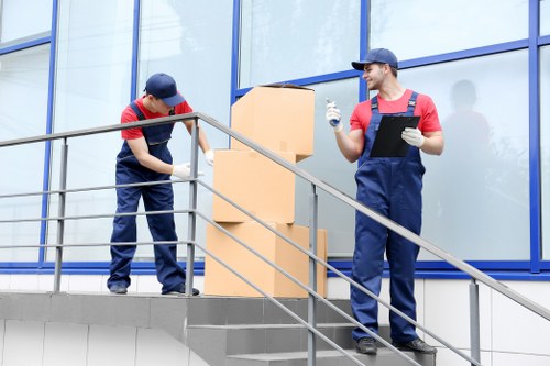 Moving team handling boxes safely during a Wandsworth removals service