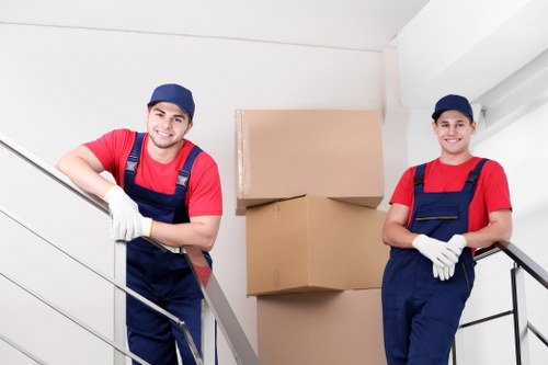Careful loading of office furniture during a local commercial move