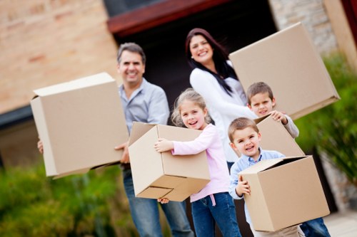 Packed moving boxes and furniture ready for transport in Wandsworth