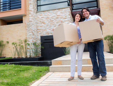 Business equipment and packed office boxes prepared for relocation